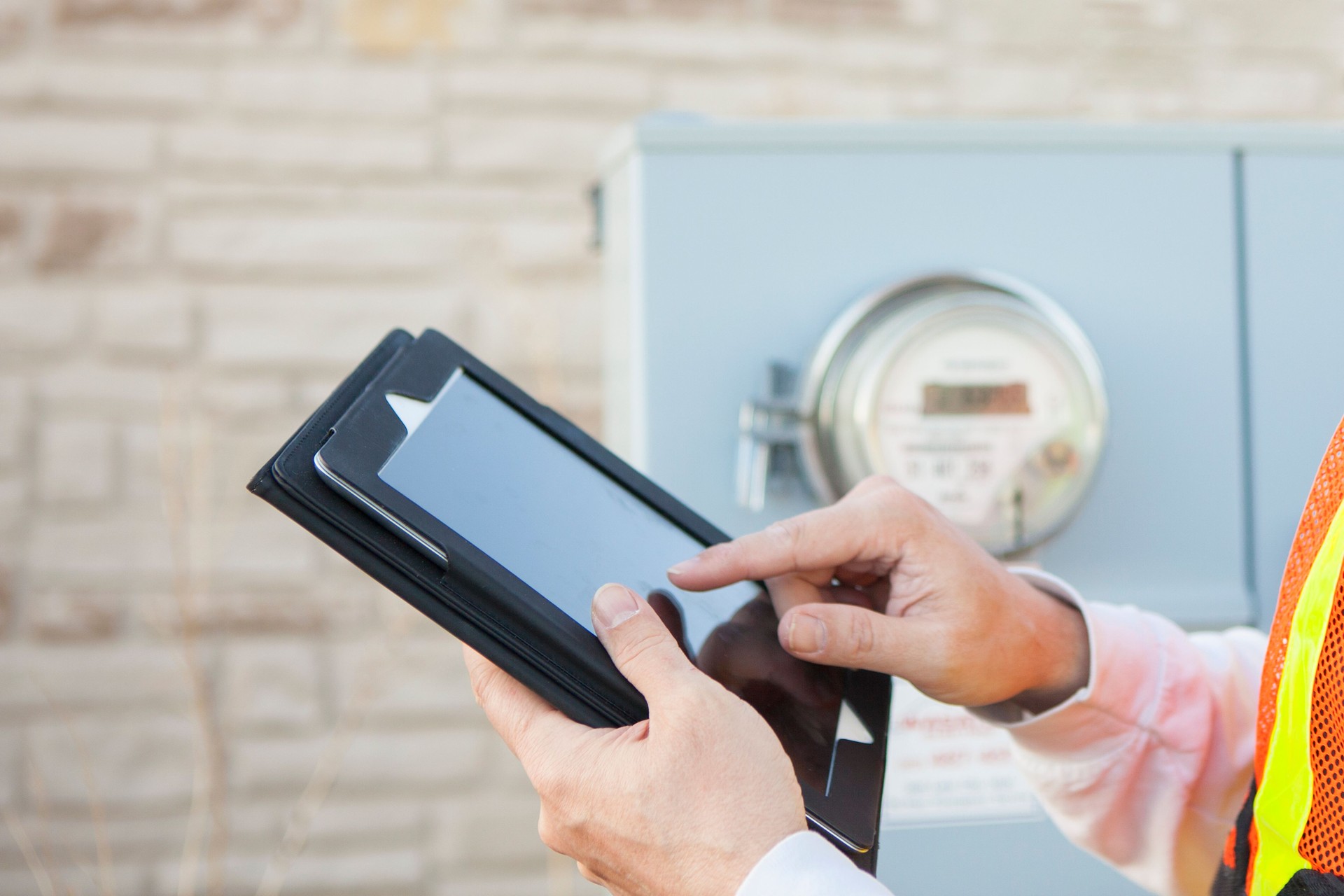 Tablet Computer being used to Collect Electricity Meter Information